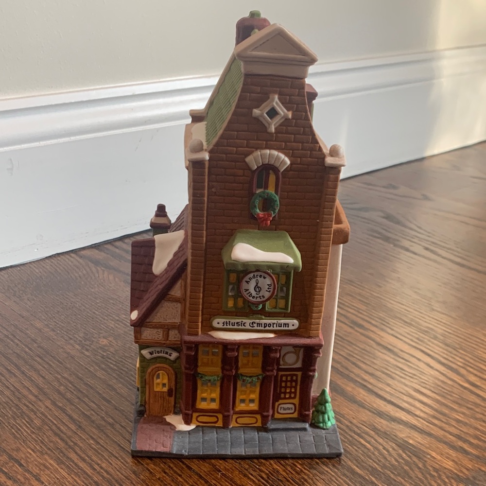 Heritage Village Collection.  Christmas in the City from 1996.  “Music Emporium”
